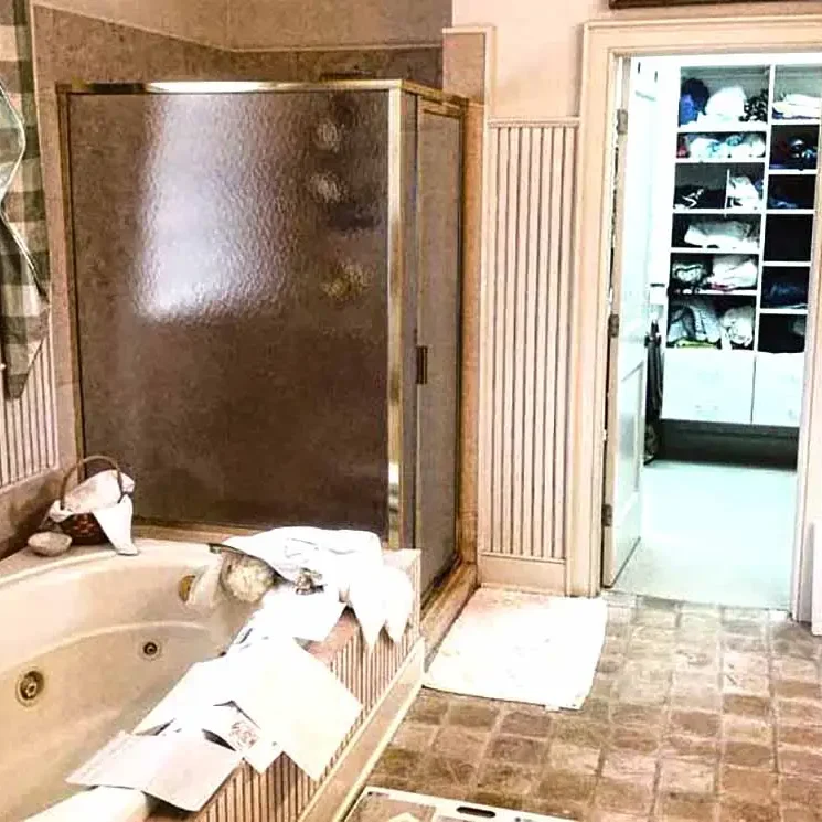 keystone-building-group-custom-home-builder-kitchen-bath-remodel-1 Bathroom with shower and tub, adjacent closet.