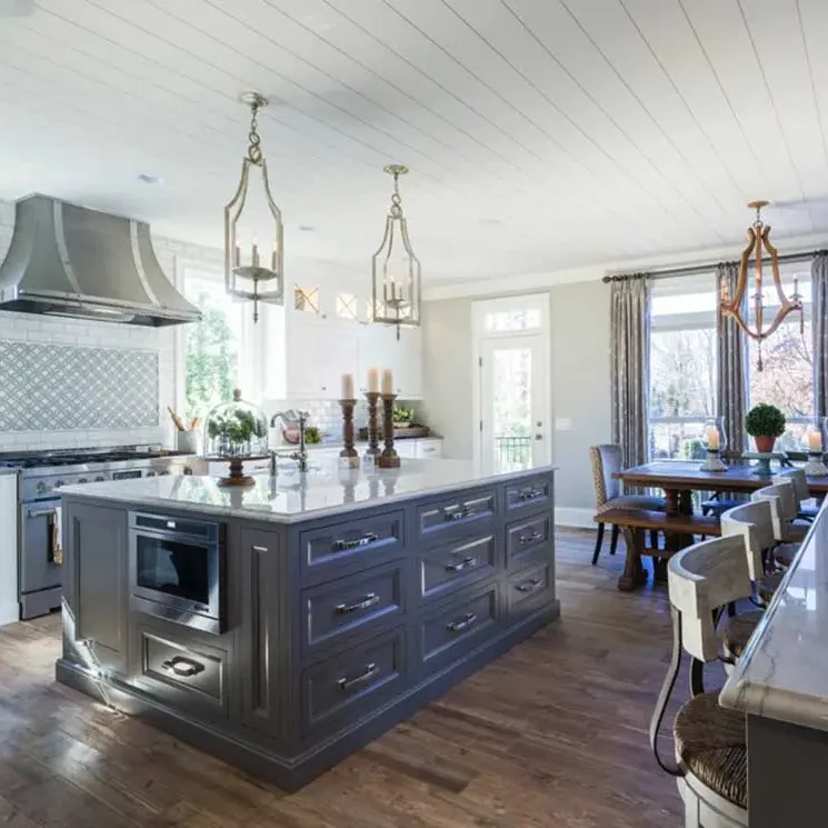 keystone-building-group-custom-home-builder-kitchen-renovation-4 Modern kitchen with large island and seating.