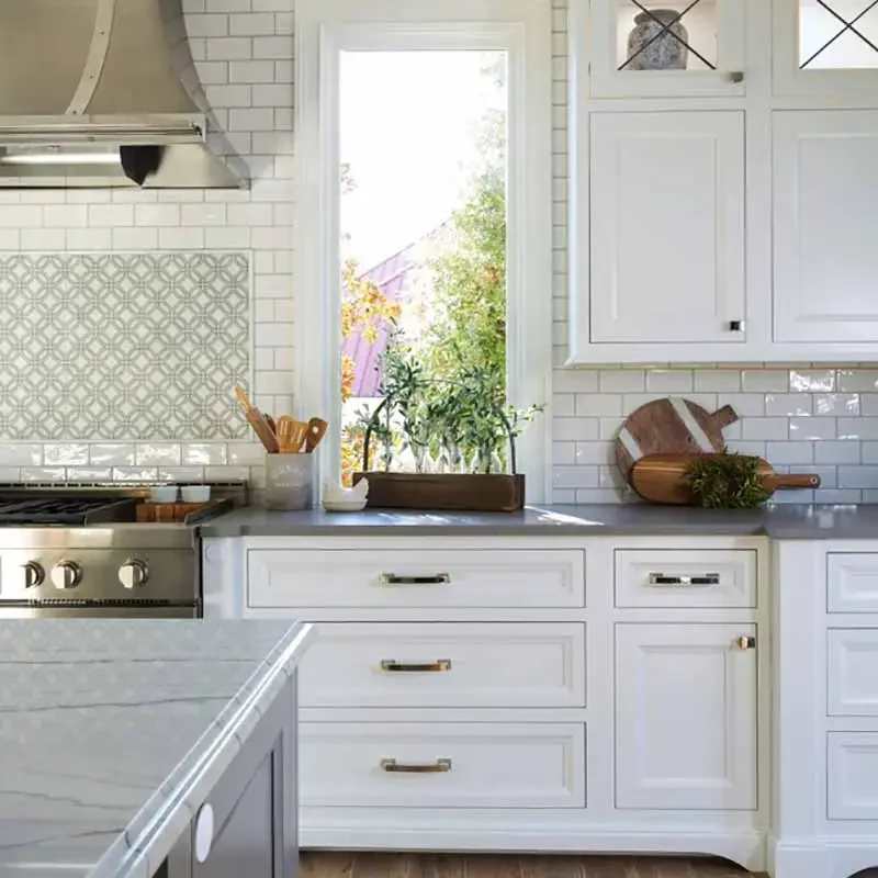 keystone-building-group-custom-home-builder-kitchen-renovation-6 Modern kitchen with white cabinets and window.